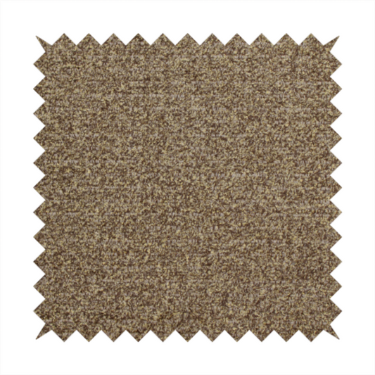 A multi-toned golden brown, textured upholstery fabric.