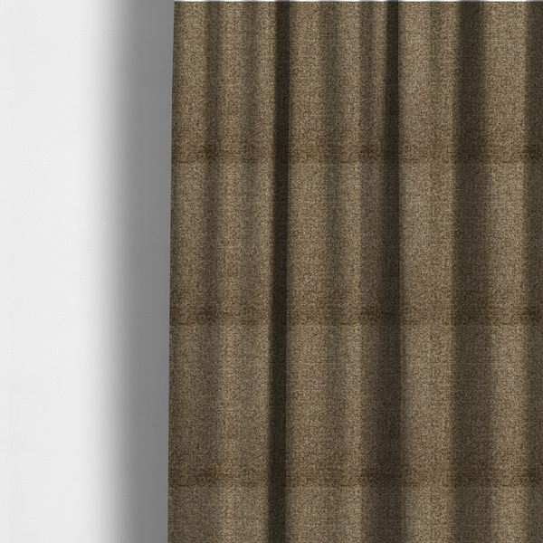 The fabric used to create these made-to-measure curtains is a multi-toned golden brown, textured upholstery fabric.