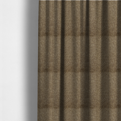 The fabric used to create these made-to-measure curtains is a multi-toned golden brown, textured upholstery fabric.