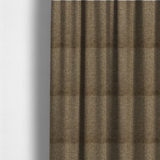 The fabric used to create these made-to-measure curtains is a multi-toned golden brown, textured upholstery fabric.