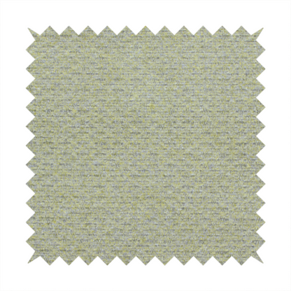 A multi-toned chartreuse green and grey textured upholstery fabric.