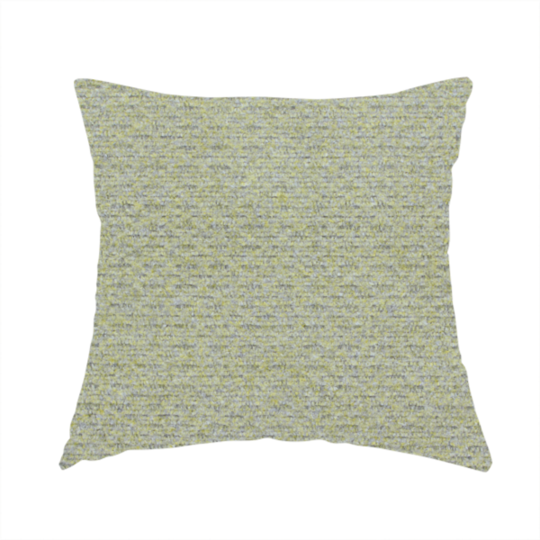 the fabric used to create this handmade cushion is a multi-toned chartreuse green and grey textured upholstery fabric.