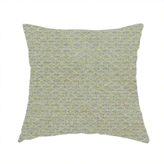 the fabric used to create this handmade cushion is a multi-toned chartreuse green and grey textured upholstery fabric.