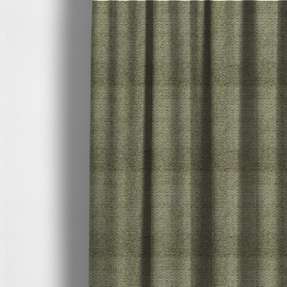 The fabric used to create these made-to-measure curtains is a multi-toned olive green textured upholstery fabric.
