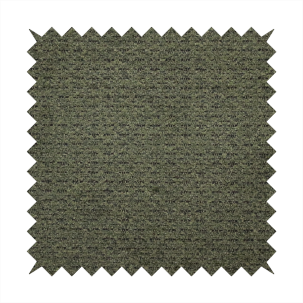 A dark forest green, heavily textured upholstery fabric.