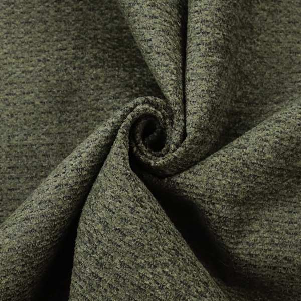 A dark forest green, heavily textured upholstery fabric.