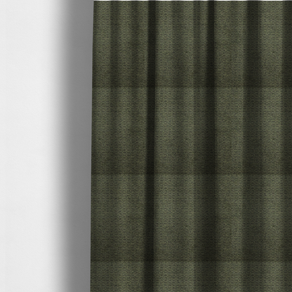 The fabric used to create these made-to-measure curtains is a dark forest green, heavily textured upholstery fabric.