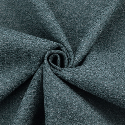 A dark teal or slate blue, textured upholstery fabric.