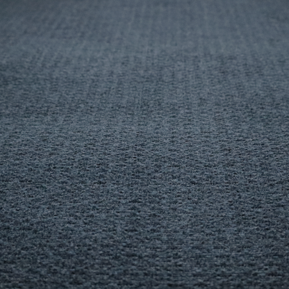 a dark navy blue, heavily textured upholstery fabric.