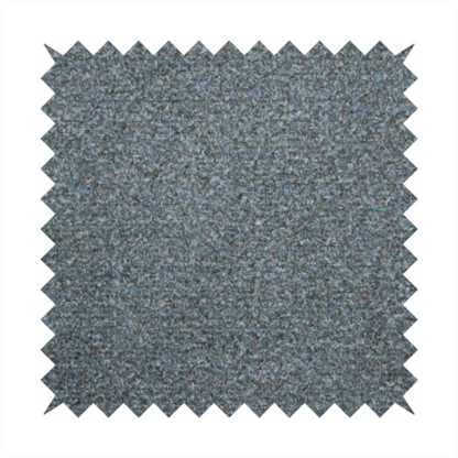 a multi-toned steel blue and grey textured upholstery fabric.