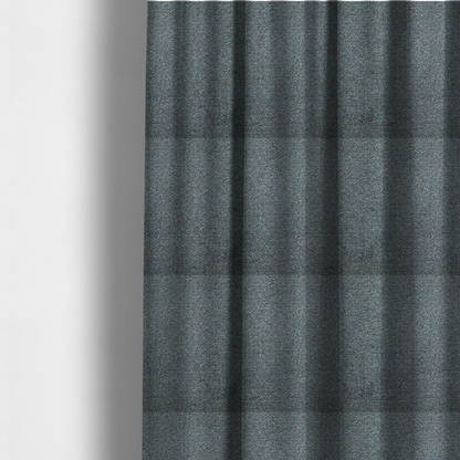 The fabric used to create these made-to-measure curtains is a multi-toned steel blue and grey textured upholstery fabric.