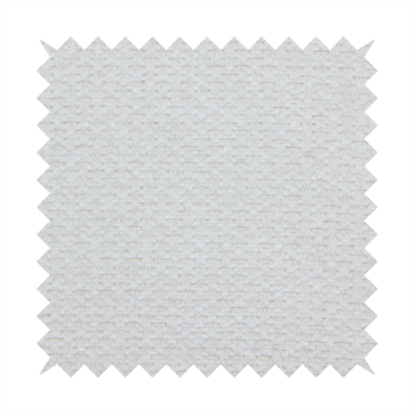 A swatch of textured cream white upholstery fabric.