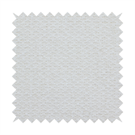 A swatch of textured cream white upholstery fabric.