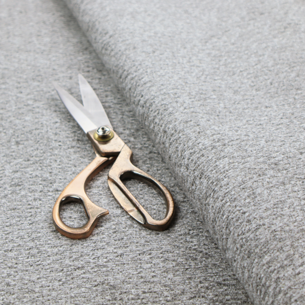 A textured mid-grey upholstery fabric with a subtle heathered effect.