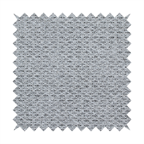 A textured light charcoal grey upholstery fabric with distinct darker horizontal weave lines.