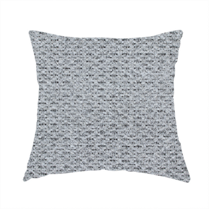 The fabric used to create this handmade cushion is a textured light charcoal grey upholstery fabric with distinct darker horizontal weave lines.