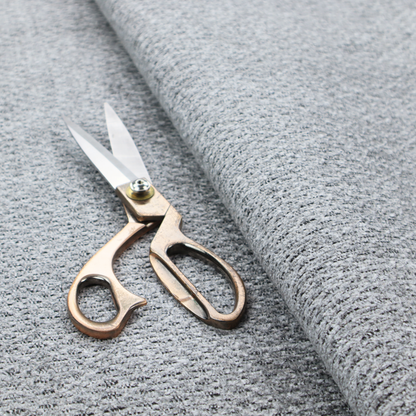 A textured light charcoal grey upholstery fabric with distinct darker horizontal weave lines.