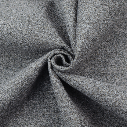 A multi-toned charcoal grey and silver textured upholstery fabric.