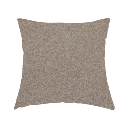 The fabric used to create this handmade cushion is a taupe or dark beige Merida Suede upholstery fabric. The textile features a highly detailed, dense, and uniform embossed pebbled pattern, giving the soft suede material an intricate, tactile shagreen texture.