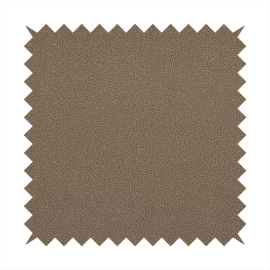 A medium brown Merida Suede upholstery fabric. The textile features a highly detailed, dense, and uniform embossed pebbled pattern, giving the soft suede material an intricate, tactile shagreen texture.