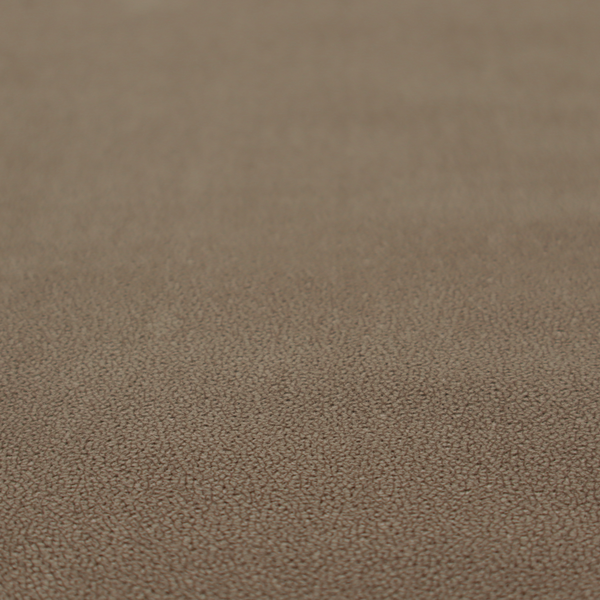 A medium brown Merida Suede upholstery fabric. The textile features a highly detailed, dense, and uniform embossed pebbled pattern, giving the soft suede material an intricate, tactile shagreen texture.