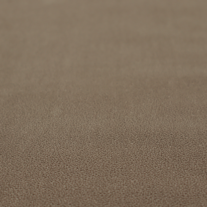 A medium brown Merida Suede upholstery fabric. The textile features a highly detailed, dense, and uniform embossed pebbled pattern, giving the soft suede material an intricate, tactile shagreen texture.