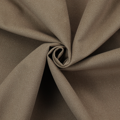 A medium brown Merida Suede upholstery fabric. The textile features a highly detailed, dense, and uniform embossed pebbled pattern, giving the soft suede material an intricate, tactile shagreen texture.