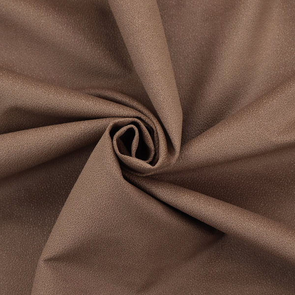 A dark brown or chestnut Merida Suede upholstery fabric. The textile features a highly detailed, dense, and uniform embossed pebbled pattern, giving the soft suede material an intricate, tactile shagreen texture.