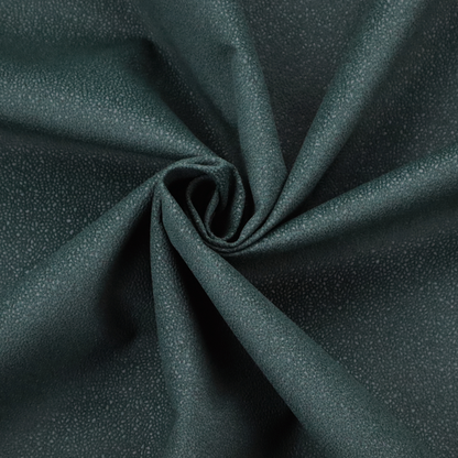 A Merida Suede upholstery fabric in a deep, dark teal or charcoal green colour.