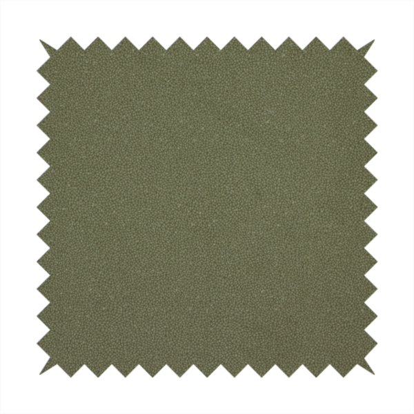 A Merida Suede upholstery fabric in a muted olive green or sage colour.