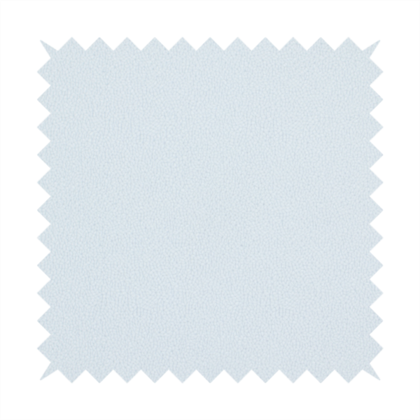 A Merida Suede upholstery fabric in a very pale, off white colour.