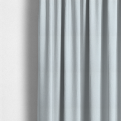 The fabric used to create these made-to-measure curtains is a Merida Suede upholstery fabric in a very pale, off white colour.