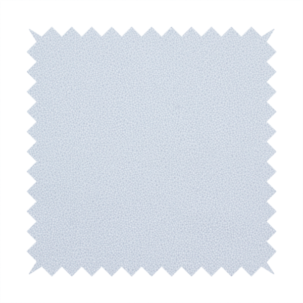 A Merida Suede upholstery fabric in a light silver colour.