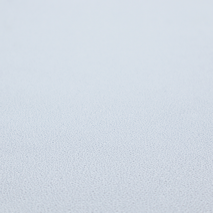 A Merida Suede upholstery fabric in a light silver colour.