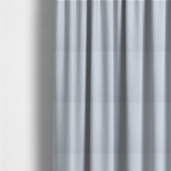 The fabric used to create these made-to-measure curtains is a Merida Suede upholstery fabric in a light silver colour.