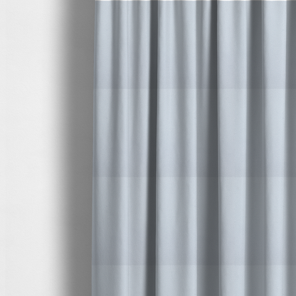 The fabric used to create these made-to-measure curtains is a Merida Suede upholstery fabric in a light silver colour.