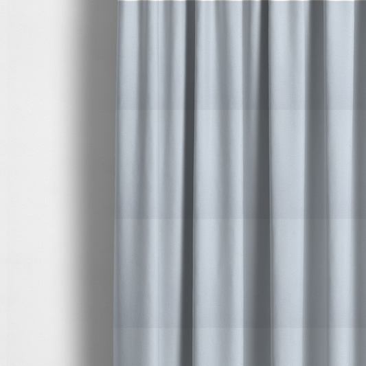 The fabric used to create these made-to-measure curtains is a Merida Suede upholstery fabric in a light silver colour.