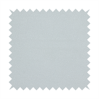 A Merida Suede upholstery fabric in a light grey colour.