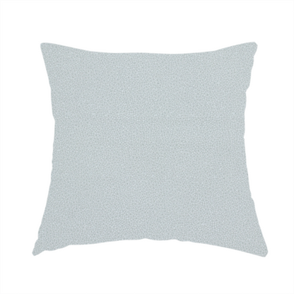 The fabric used to create this handmade cushion is a Merida Suede upholstery fabric in a light grey colour.