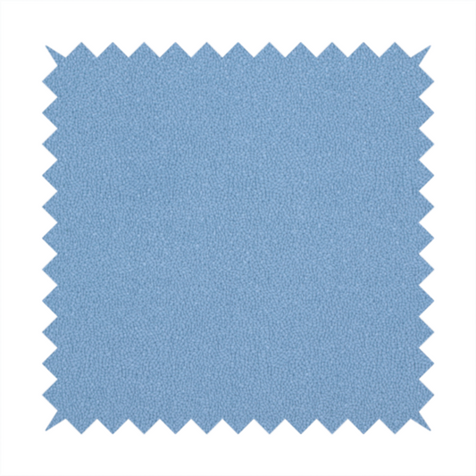 Merida Suede upholstery fabric in a soft, medium sky blue colour.