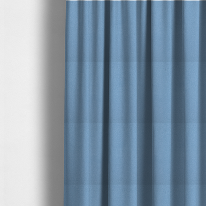 The fabric used to create these made-to-measure curtains is a Merida Suede upholstery fabric in a soft, medium sky blue colour.