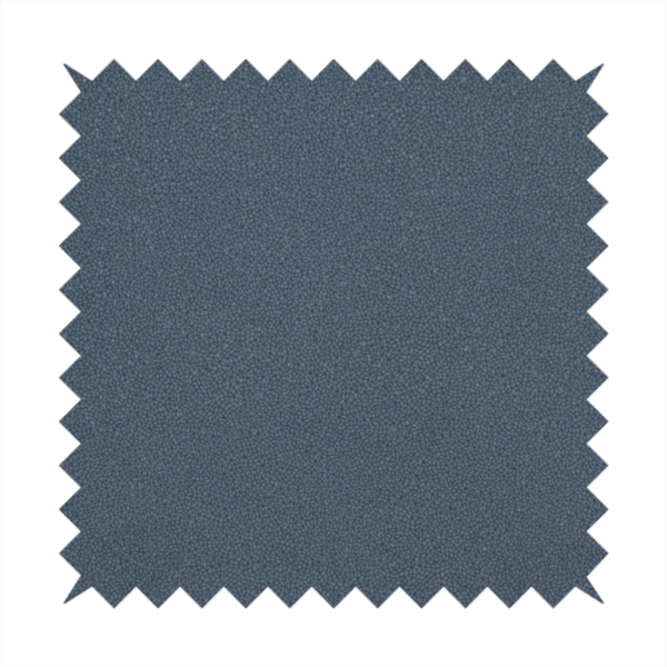 Merida Suede upholstery fabric in a muted slate blue or denim blue colour.