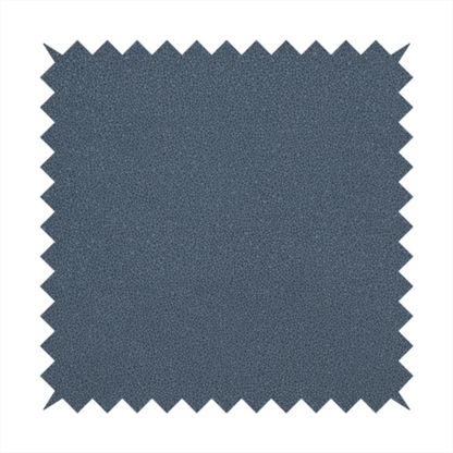 Merida Suede upholstery fabric in a muted slate blue or denim blue colour.