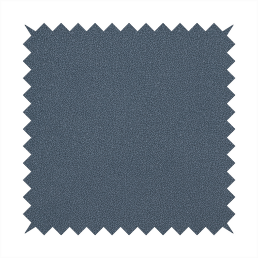 Merida Suede upholstery fabric in a muted slate blue or denim blue colour.