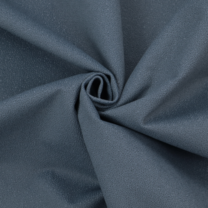 Merida Suede upholstery fabric in a muted slate blue or denim blue colour.