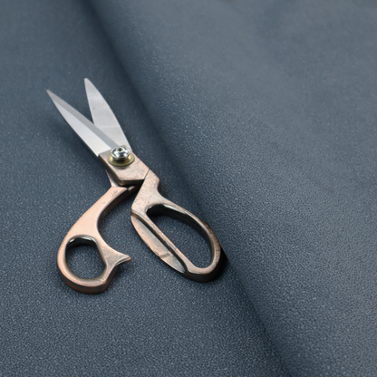 Merida Suede upholstery fabric in a muted slate blue or denim blue colour.