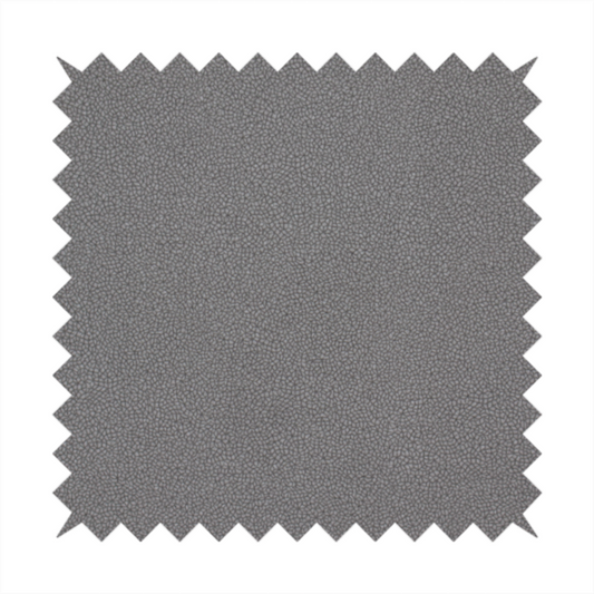 Merida Suede upholstery fabric in a medium charcoal grey colour.