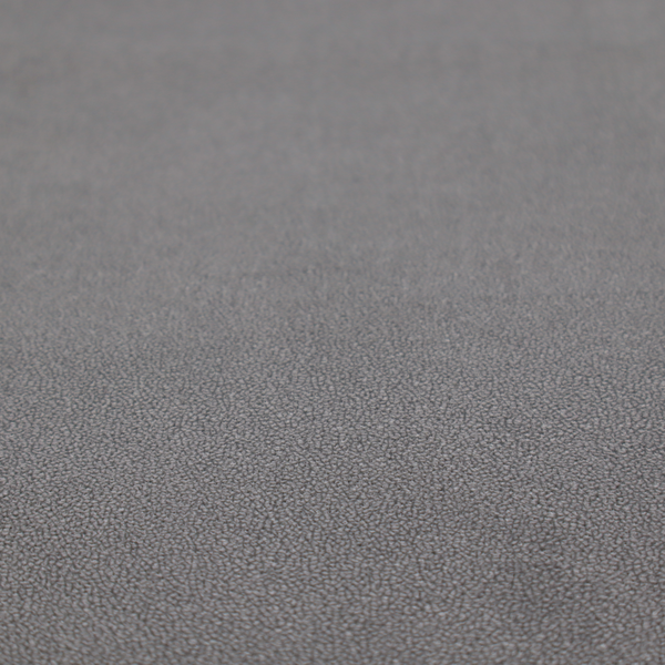 Merida Suede upholstery fabric in a medium charcoal grey colour.