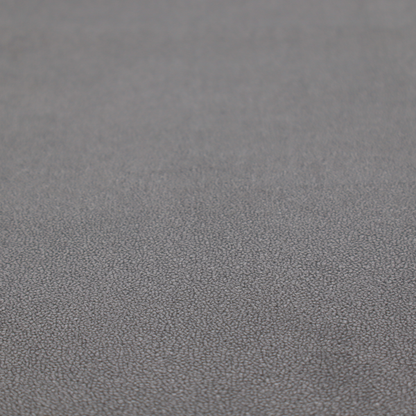 Merida Suede upholstery fabric in a medium charcoal grey colour.