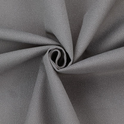 Merida Suede upholstery fabric in a medium charcoal grey colour.